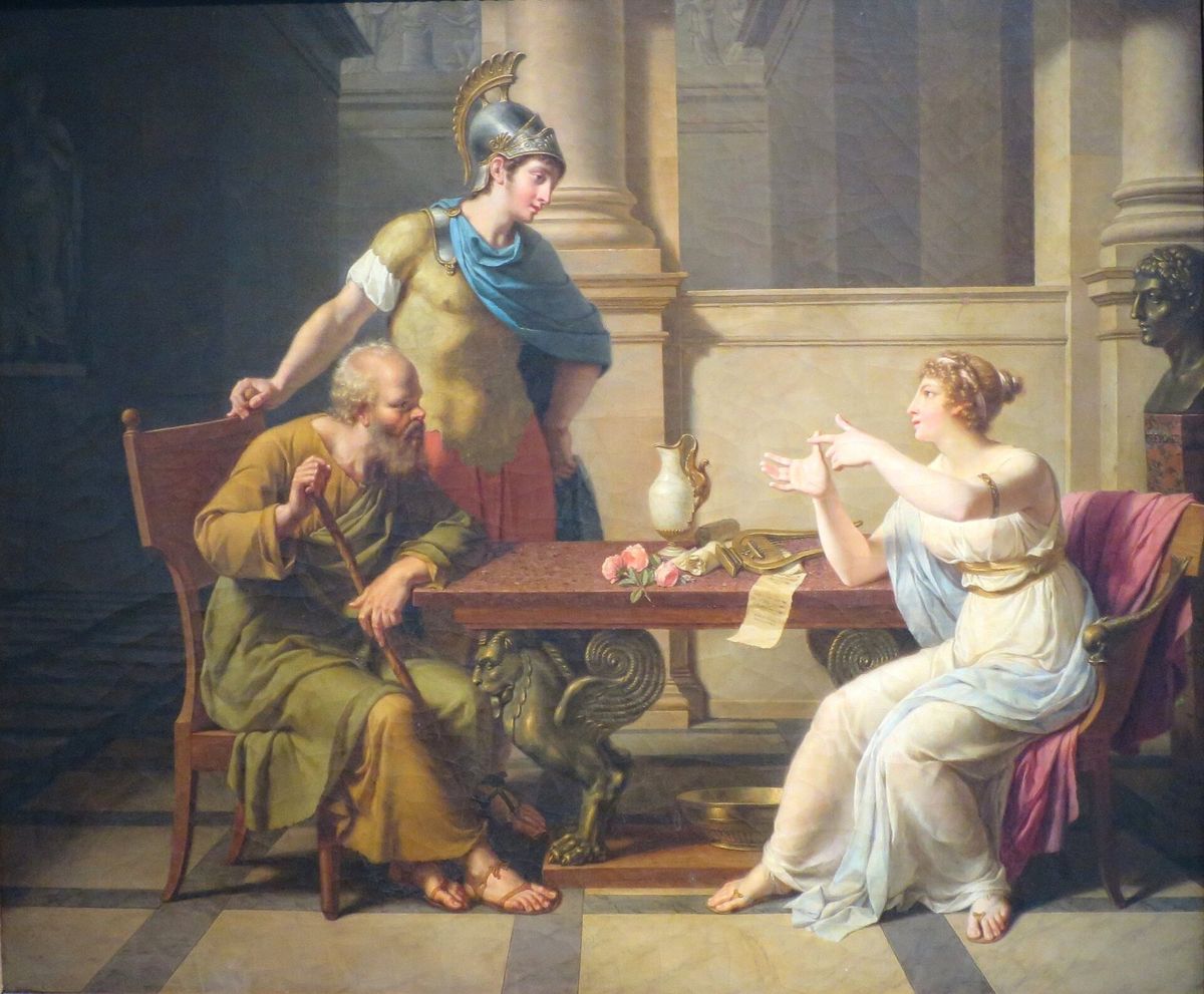 Monsiau's The Debate of Socrates and Aspasia: Aspasia, seated, argues her point across a table while Socrates leans on his stick and listens